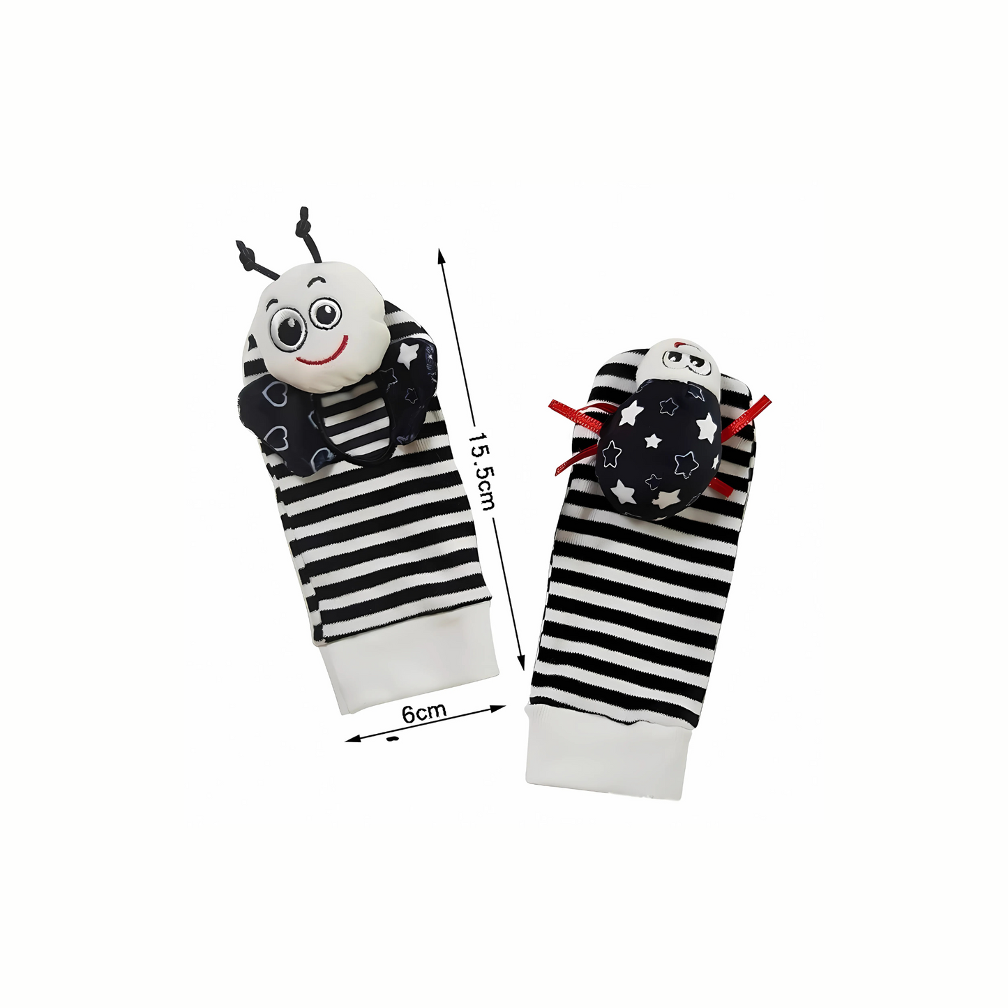 A pair of black and white baby rattle socks with measurements. The socks has a measurement of 15.5cm from head to heel, and 6cm across the foot. The image shows the eco friendly toy's size.