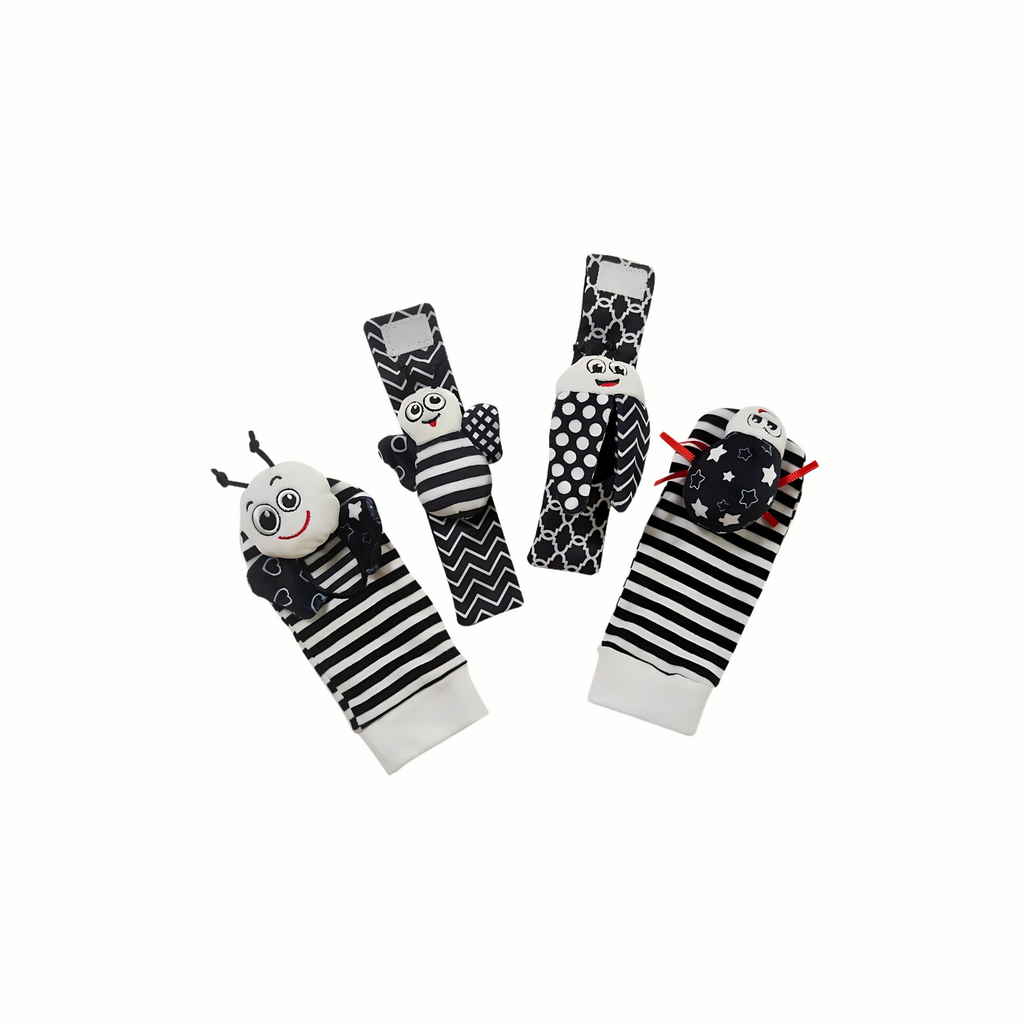 A set of black and white baby rattle socks and wristbands. The socks and wristbands have high contrast patterns like stripes and polka dots with animal faces. These eco friendly rattles are designed to stimulate visual and auditory development in infants.