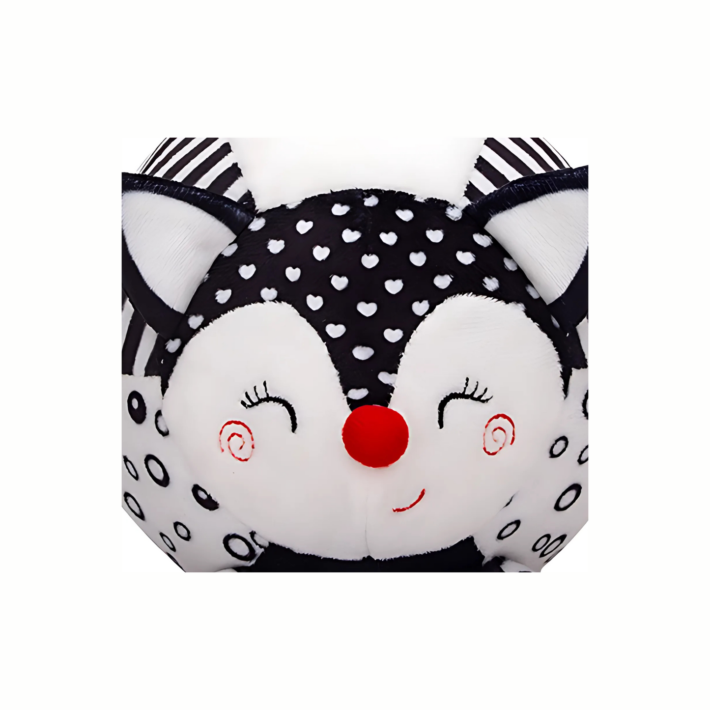 Close-up of the plush black and white fox sensory toy face, designed for visual stimulation