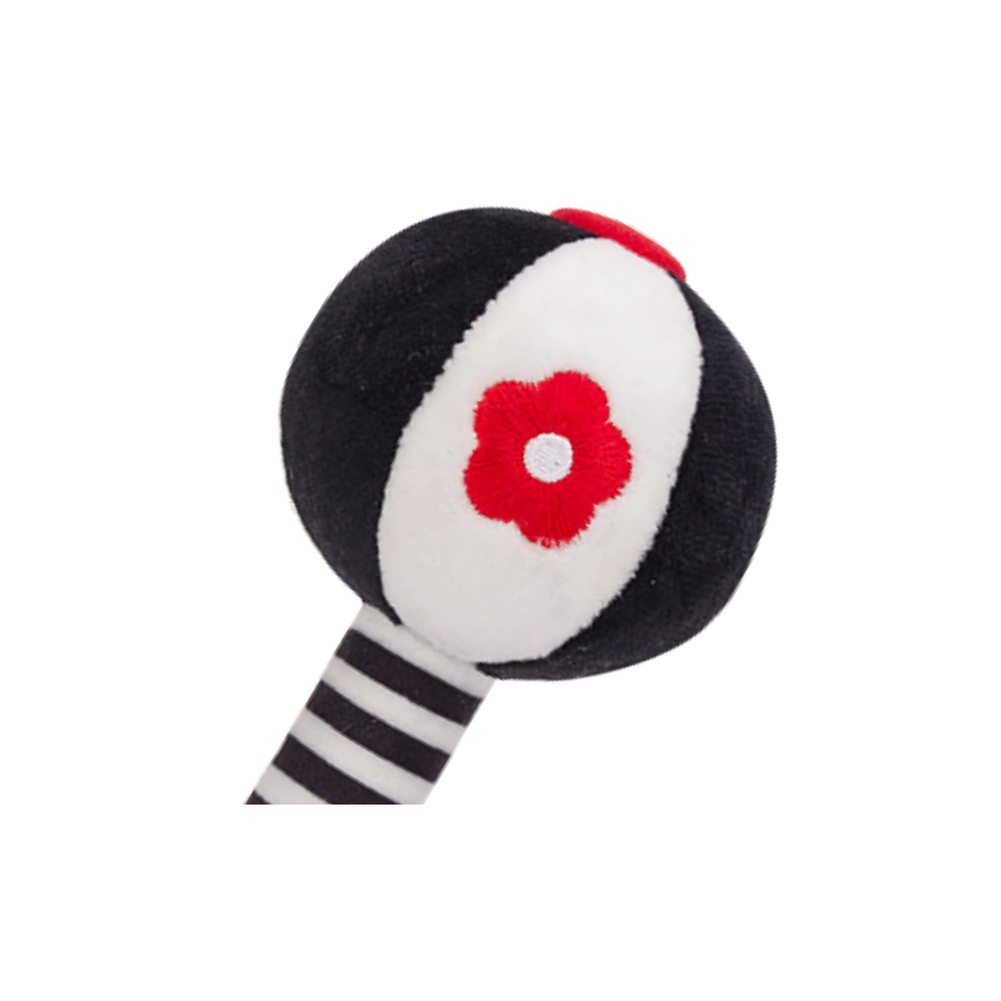 Close-up of a single black and white plush rattle, highlighting its high-contrast design for newborns
