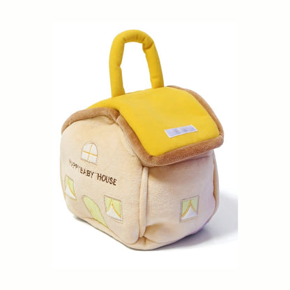 The Plush House Rattle Set shown closed, demonstrating how the plush house doubles as a storage box for the rattles, keeping the set cozy and tidy.