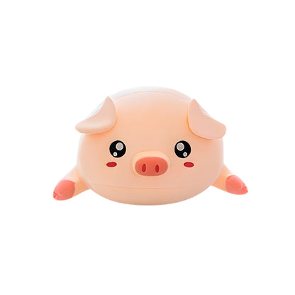 Close-up of the cute face of the Pink Plush Huggable Piggy stuffed animal toy highlighting its cute big eyes and gentle expression.