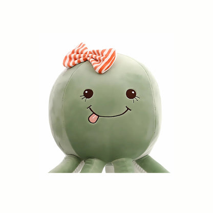 Close-up of the adorable face of the Plush Playful Octopus stuffed animal toy in green, highlighting its gentle eyes and soft, huggable form.