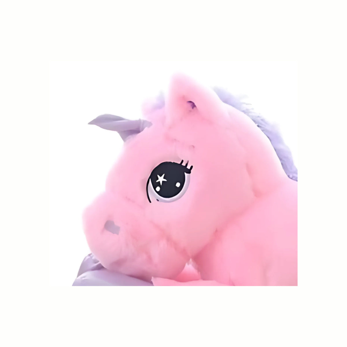 Close-up of the majestic face and shimmering horn of the Plush Snuggly Unicorn stuffed animal toy  in pink, perfect for dreaming up magical stories