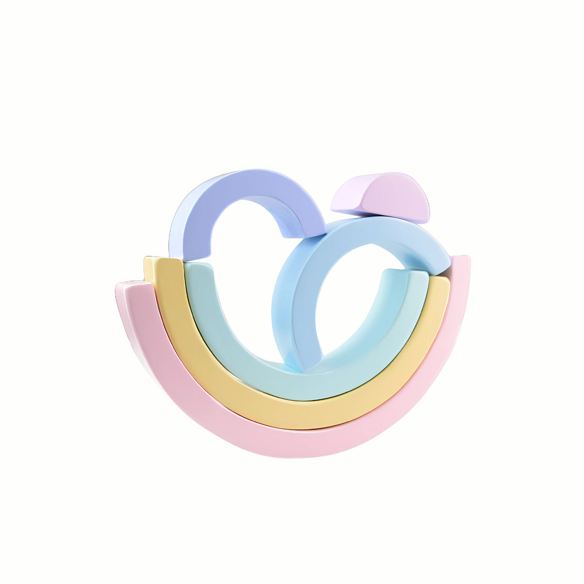 The Silicone Pastel Rainbow Stacking Blocks set out in arch and tunnel shapes, showing the range of sizes that help develop fine motor skills and spatial reasoning.