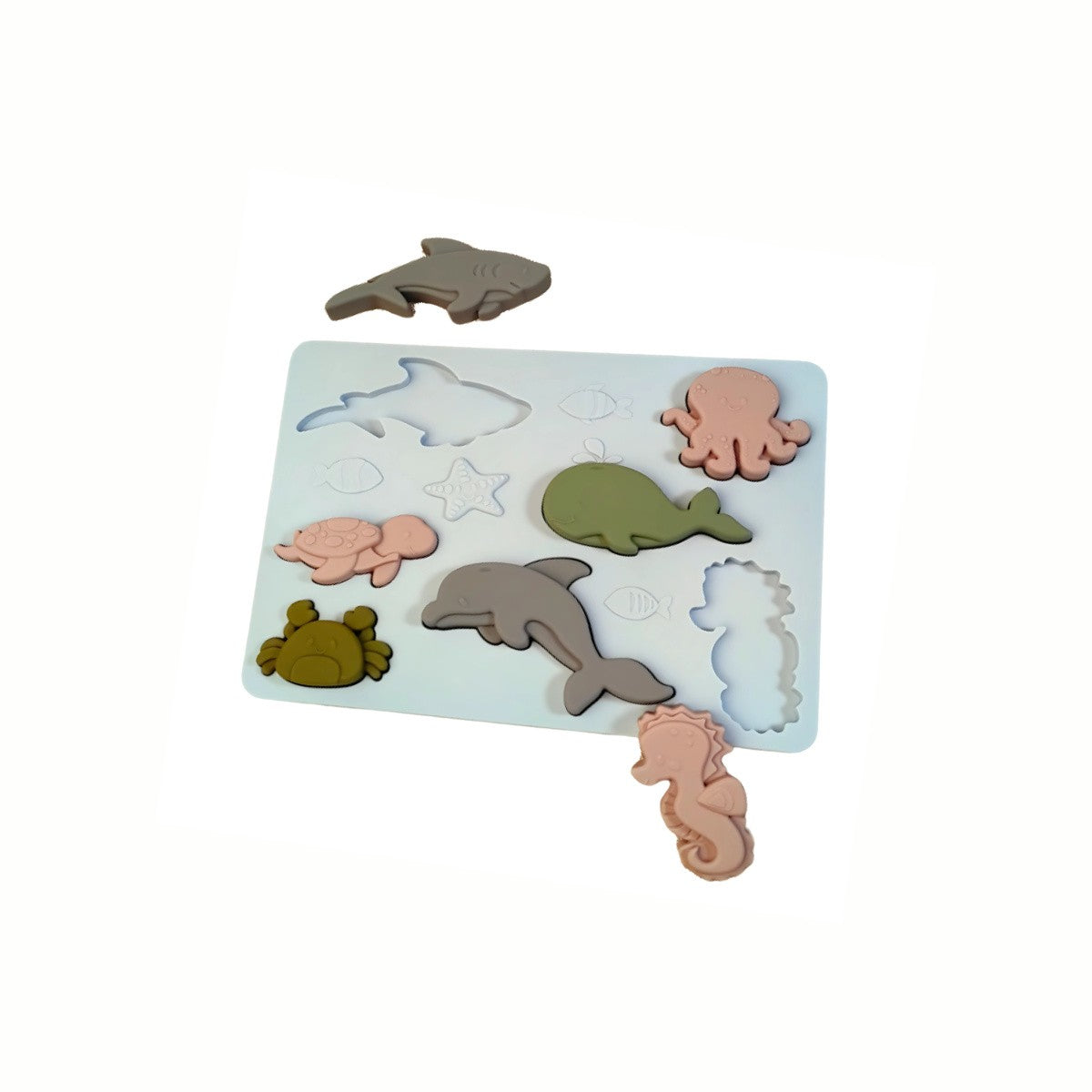 Silicone Sea Creatures Puzzle partially assembled with some pieces set aside, showing the challenge involved in hand-eye coordination.