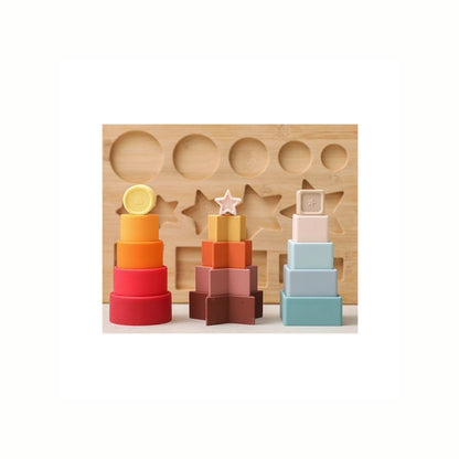 Silicone Shapes Stacking Puzzle, showing the soft silicone pieces stacked in front of the wooden base, a food-grade silicone and sustainably sourced toy.