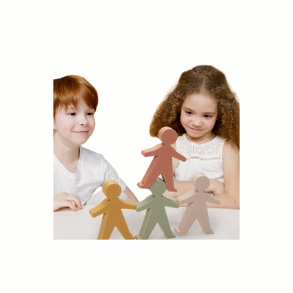 children playing with the silicone stacking figures.