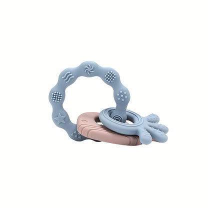Full view of the blue Silicone Teething Keyring, a clever teether with a variety of textures for maximum comfort.