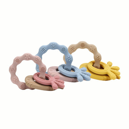 Silicone Teething Keyring set in pink, blue, and yellow, a practical and comforting companion for little ones during their teething journey. Crafted from BPA-free, Food Grade Silicone for safety