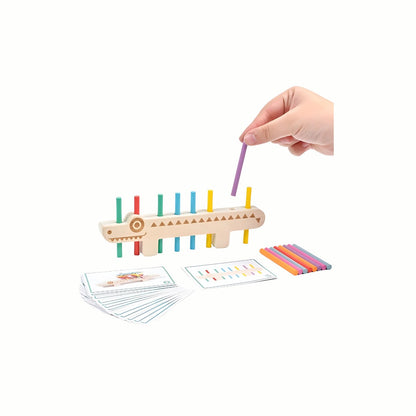 A  hand inserting a colored stick into the Wooden Alligator Pattern Game, following the card for pattern recognition and fine motor practice.