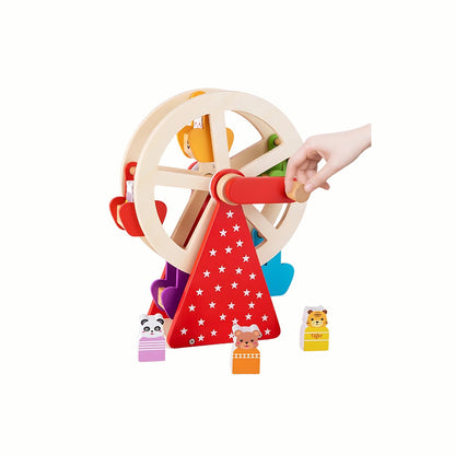 A  hand turning the Wooden Animal Ferris Wheel, engaging in pretend play by giving the animal figures a ride.