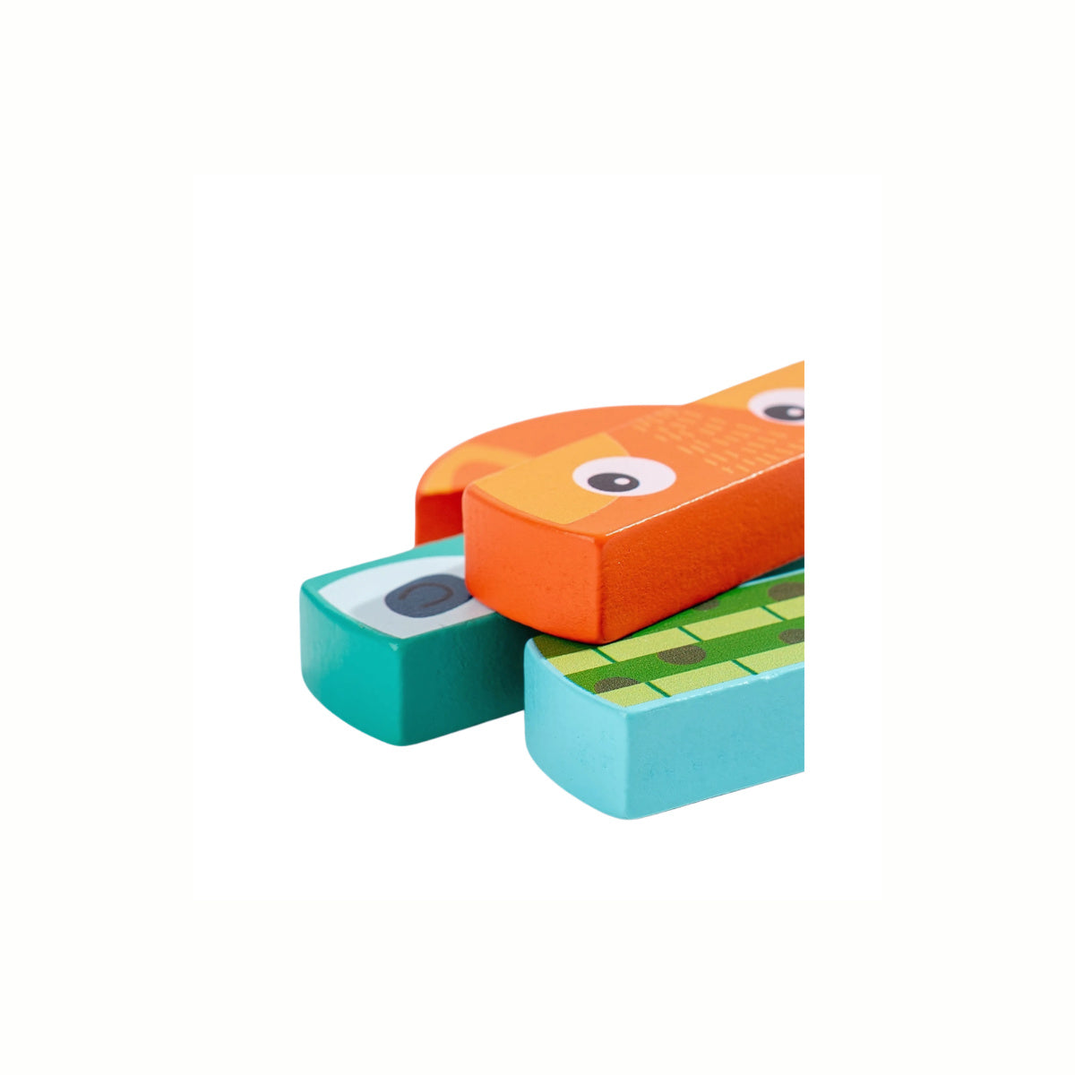 A close-up of the individual wooden blocks from the Animal Matching Jenga Game, highlighting the colorful animal artwork and smooth texture.