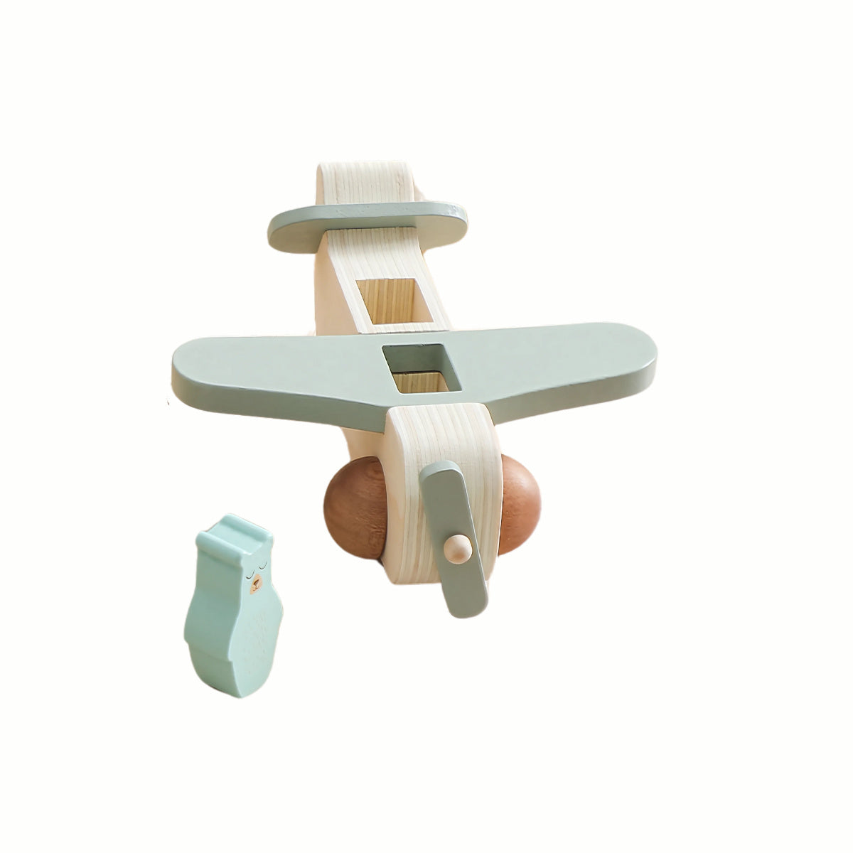 Wooden Animal Plane, showing one animal figure next to the plane's open cockpit, illustrating the pretend play action of inserting the animals to 'fly'.