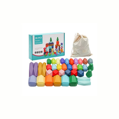 Wooden Balancing Stones Set with all the colorful, uniquely shaped pieces laid out next to the included cloth bag for easy storage.