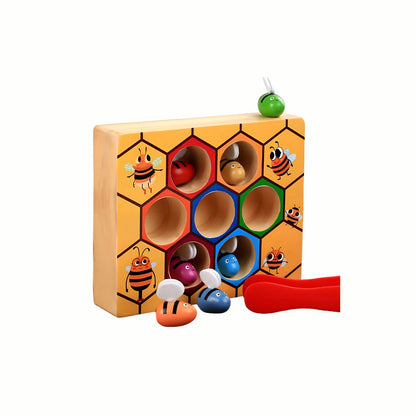 Wooden Bee to Hive Matching Game, showing the colorful honeycomb board with some wooden bees inserted and the tongs ready for use, crafted from sustainably sourced wood.