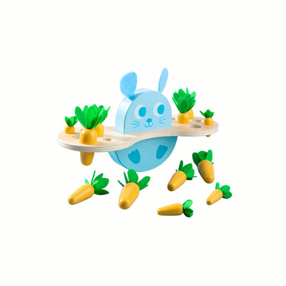 Wooden Bunny & Carrot Balancing Game, showing the rocking bunny base with some carrots balanced and others scattered, a high-quality toy.