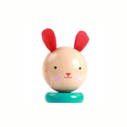 Close-up of the Wooden Bunny Stacking Tower head, showcasing the cute felt ears and smooth, water-based painted wood that supports early coordination.