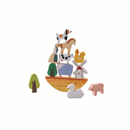 Wooden Farm Balance Game, showing the colorful farm animals and blocks stacked on the crescent base to form a tall tower, crafted from sustainable wood.