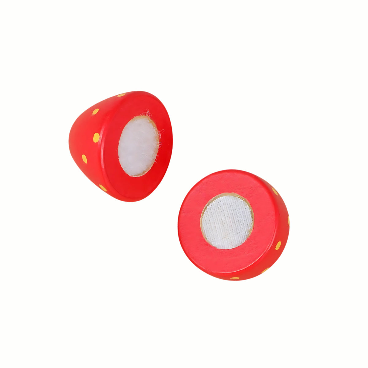 Close-up of a fruit piece from the Wooden Food Cutting Set cut in half, clearly showing the Velcro that allows food to be realistically sliced, a high-quality toy.