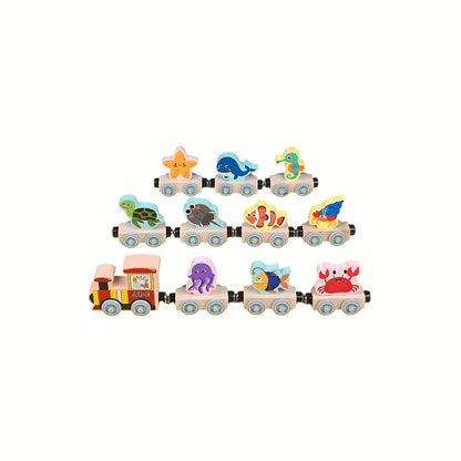 Wooden Magnetic Animal Train (Ocean variant), showing the three colorful magnetic carriages with an octopus, jellyfish, and fish separated, promoting fine motor skills.