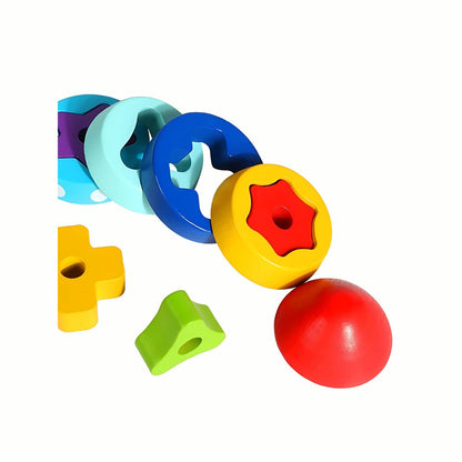 "A close-up of the different shapes and bright colors of the rings from the Wooden Rocket Stacking Rings set, teaching color recognition and spatial skills.