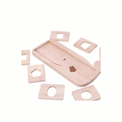 Close-up of the charming wooden whale base of the Wooden Whale Shape Sorter Puzzle, with colorful geometric insert pieces next to it, demonstrating fine motor skills manipulation.